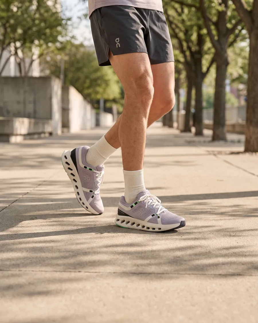 Lilac Cloudsurfer 2 trainers on a sunlit path