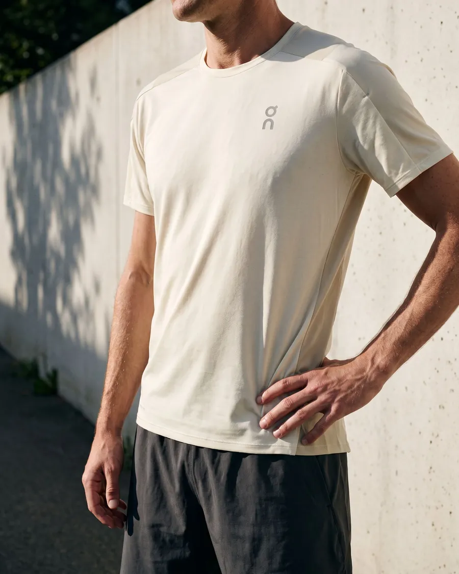 An off-white Performance-T in natural morning light